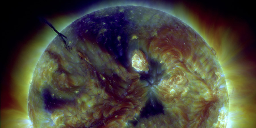 Filament eruption, incoming coronal holes